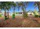 Mature trees surround this home's backyard at 202 Forest Park Ln, Lady Lake, FL 32159