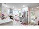 Modern kitchen, featuring stainless steel appliances and white cabinets at 202 Forest Park Ln, Lady Lake, FL 32159
