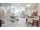 Modern kitchen with white cabinets and stainless steel appliances at 202 Forest Park Ln, Lady Lake, FL 32159