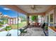 Screened porch overlooks backyard with shed and trees at 202 Forest Park Ln, Lady Lake, FL 32159