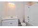 Bathroom features a single vanity, toilet and bathtub at 2878 Supermarine Rd, Tavares, FL 32778