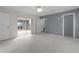 Bedroom with pool view and sliding door access at 3614 Kingswood Ct, Clermont, FL 34711
