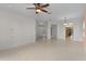 Open living room with views to kitchen and entryway at 3614 Kingswood Ct, Clermont, FL 34711