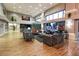 Community clubhouse with seating area and pool view at 3614 Kingswood Ct, Clermont, FL 34711