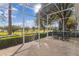 Spacious screened patio overlooking a scenic view at 3614 Kingswood Ct, Clermont, FL 34711