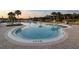 Relaxing freeform pool perfect for lounging at 3614 Kingswood Ct, Clermont, FL 34711