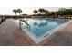 Resort-style pool with plenty of lounge chairs at 3614 Kingswood Ct, Clermont, FL 34711