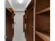 Large walk-in closet with ample shelving and hanging space at 3614 Kingswood Ct, Clermont, FL 34711