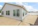 Home exterior and large backyard patio at 4056 Venetian Ln, The Villages, FL 32163