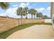 Private backyard with block wall and patio at 4056 Venetian Ln, The Villages, FL 32163