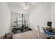 Home gym with weight equipment and desk at 4056 Venetian Ln, The Villages, FL 32163