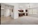 Open concept kitchen and dining area with hardwood floors and island at 4056 Venetian Ln, The Villages, FL 32163