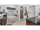 Elegant bathroom with soaking tub, walk-in shower, and double vanity at 4080 Longbow Dr, Clermont, FL 34711