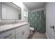 Updated bathroom with granite countertop and white cabinets at 4566 County Road 116, Wildwood, FL 34785