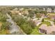 Aerial view showcasing the home's neighborhood and surrounding landscape at 4817 Summerbridge Cir, Leesburg, FL 34748