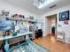 Bright and spacious art studio, featuring a large work table and ample storage at 4817 Summerbridge Cir, Leesburg, FL 34748