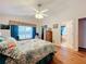 Bright bedroom with a queen bed and ensuite bathroom at 4817 Summerbridge Cir, Leesburg, FL 34748