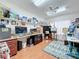 Studio space featuring a computer station and artwork at 4817 Summerbridge Cir, Leesburg, FL 34748