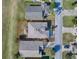 Aerial view of the house and surrounding area at 520 Grand Vista Trl, Leesburg, FL 34748