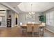 Formal dining room with a chandelier and neutral wall colors at 5312 Galley Way, Oxford, FL 34484