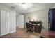 Home office features built-in shelving and a desk at 5312 Galley Way, Oxford, FL 34484