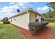 House exterior showcasing a side view and landscaping at 5312 Galley Way, Oxford, FL 34484