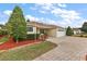 Attractive curb appeal with paver driveway at 5312 Galley Way, Oxford, FL 34484
