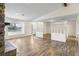 Spacious living room featuring hardwood floors and natural light at 5409 Twin Palms Rd, Fruitland Park, FL 34731