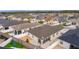 Aerial view of home's backyard, showing patio and fence at 9224 Se 167Th Ford St, The Villages, FL 32162
