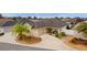 Aerial view of charming house with landscaped yard at 9224 Se 167Th Ford St, The Villages, FL 32162