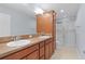 Bathroom boasts double sinks, a large vanity, and a separate shower at 9224 Se 167Th Ford St, The Villages, FL 32162
