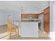Kitchen with breakfast bar and modern appliances at 9224 Se 167Th Ford St, The Villages, FL 32162