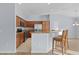Kitchen features stainless steel appliances and wood cabinets at 9224 Se 167Th Ford St, The Villages, FL 32162