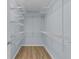 Large walk-in closet with wire shelving, providing ample storage space at 9224 Se 167Th Ford St, The Villages, FL 32162