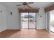 Bright dining room with tile floors and access to the screened patio at 952 Avalon Ave, The Villages, FL 32159