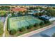 Community tennis and pickleball courts near clubhouse at 10349 Silver Maple Ave, Oxford, FL 34484