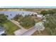 Aerial view showing home's location by the lake at 170 Hidden Pointe Ln, Groveland, FL 34736