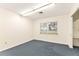 Simple office featuring a window, carpet, and closet at 1801 Vine St, Leesburg, FL 34748