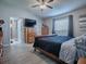 Spacious bedroom with wood flooring and built-in dresser at 17545 Se 96Th Ct, Summerfield, FL 34491