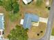 Single-story home with a large yard and a two-car garage at 17925 Se 100Th Ter, Summerfield, FL 34491