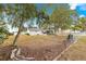 Spacious backyard with mature trees and chain link fence at 17925 Se 100Th Ter, Summerfield, FL 34491
