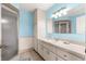Clean bathroom with beige vanity and shower/tub combo at 17925 Se 100Th Ter, Summerfield, FL 34491