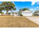 Single story home with attached garage and landscaped yard at 17925 Se 100Th Ter, Summerfield, FL 34491