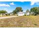 Single story home with attached garage and landscaped yard at 17925 Se 100Th Ter, Summerfield, FL 34491