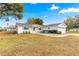 Cute ranch style home with light blue shutters and a 2-car garage at 17925 Se 100Th Ter, Summerfield, FL 34491