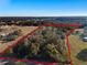 Aerial view of a wooded lot, ready to build your dream home at 22740 County Road 44A, Eustis, FL 32736