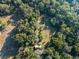 Aerial view showing home surrounded by trees at 22740 County Road 44A, Eustis, FL 32736