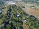 Aerial view of a house nestled in a wooded area at 22740 County Road 44A, Eustis, FL 32736