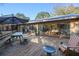 Large deck with outdoor seating and views of the backyard at 22740 County Road 44A, Eustis, FL 32736