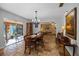 Spacious dining room with tile floors and access to patio at 22740 County Road 44A, Eustis, FL 32736